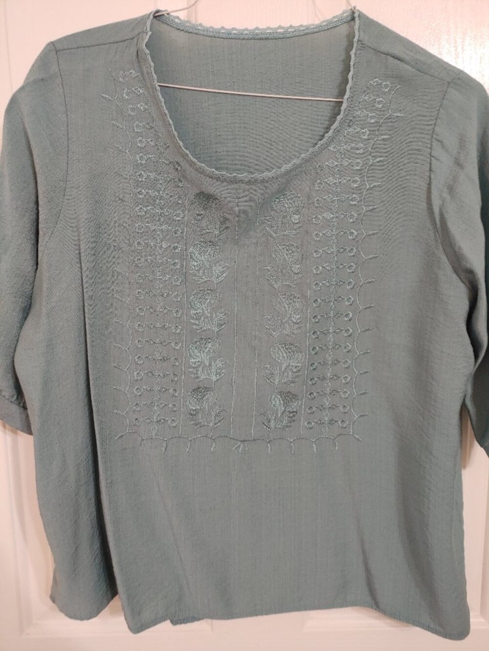 Size XL by measurements blue top